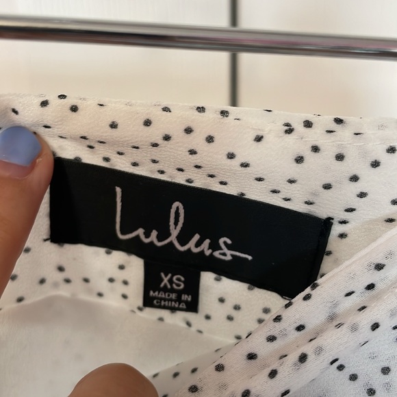 Lulu’s White and black dotted mini skirt with pleats and ruffle hem. Size XS - Picture 4 of 4